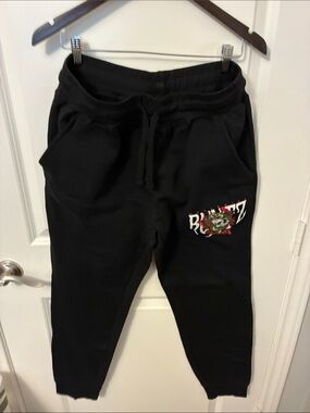 Black Graphic Jogger Sweatpants with Floral Crest Accent